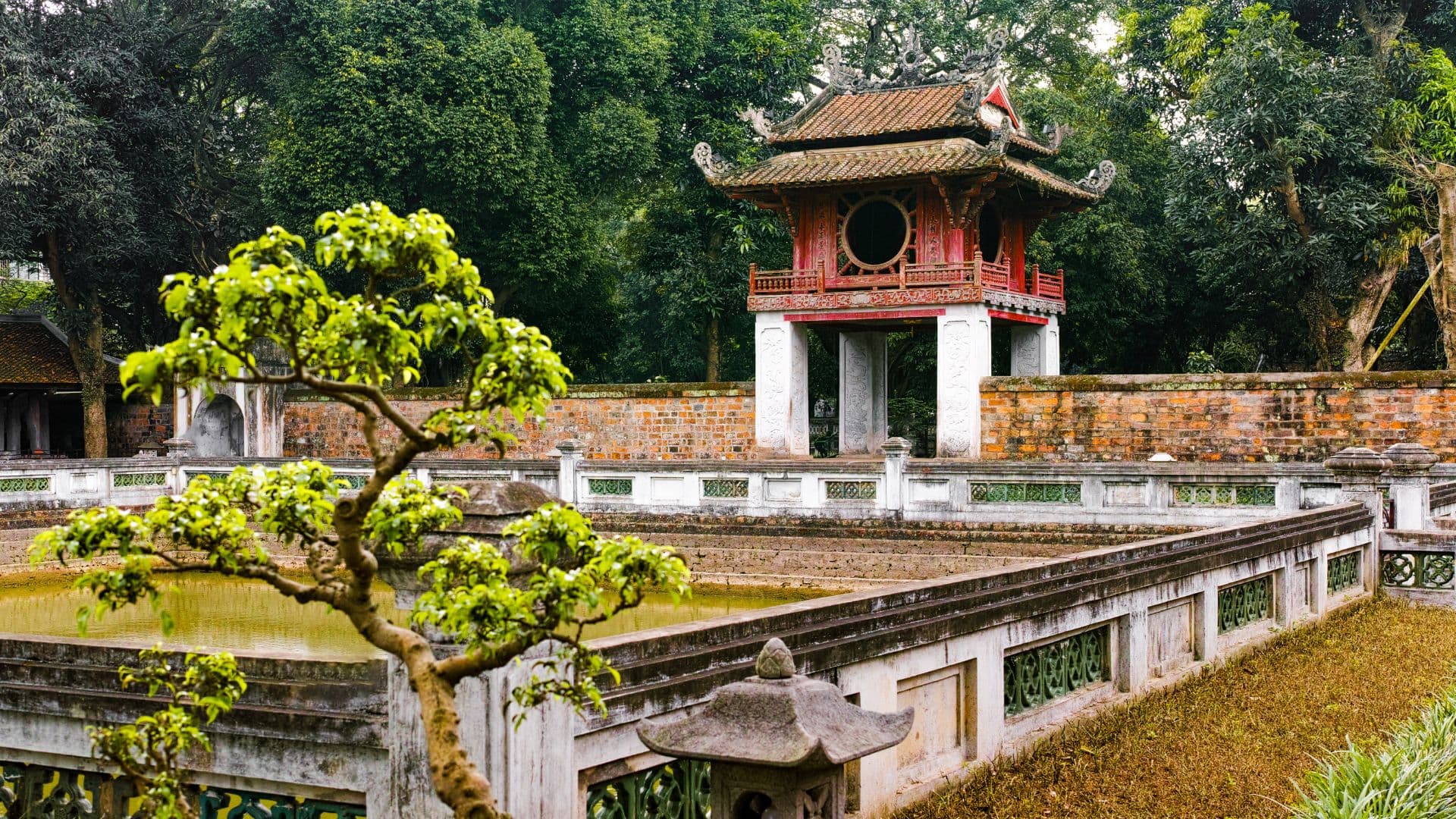 The Temple of Literature is Vietnam’s first university and a serene symbol of Confucian learning, featuring ancient courtyards, stone steles, and traditional architecture.