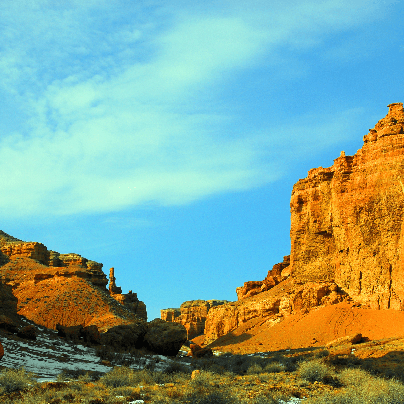 Charyn Canyon: Often compared to the Grand Canyon, this natural wonder features dramatic rock formations, deep gorges, and stunning landscapes. Explore the Valley of Castles, where centuries-old sandstone cliffs create a mesmerizing backdrop for photography and sightseeing. Visitors can enjoy hiking trails, guided tours, and breathtaking panoramic views that make it a must-visit attraction in Kazakhstan.