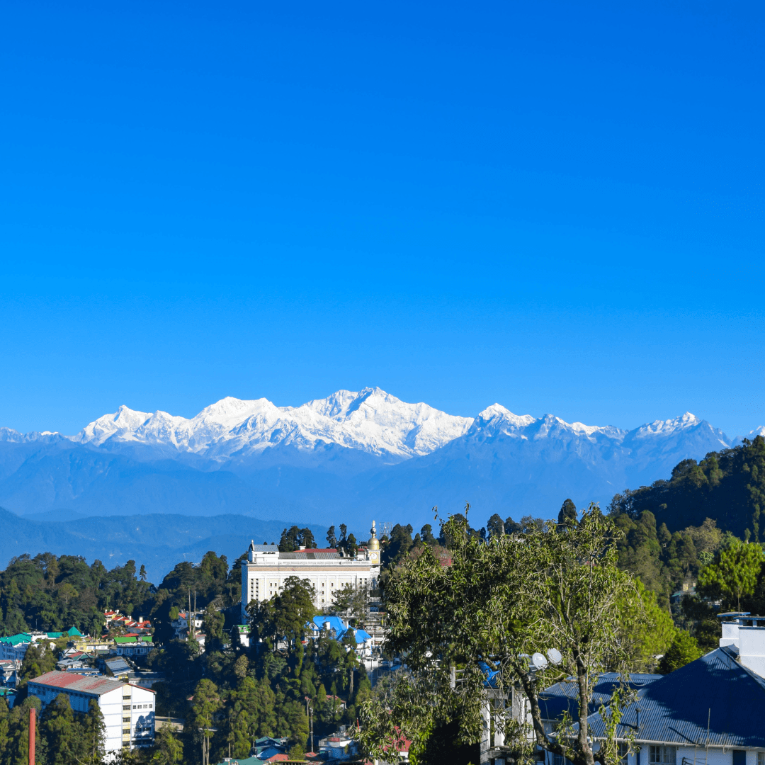 Experience the awe-inspiring sunrise at Tiger Hill, where the first rays of the sun illuminate the peaks of Kanchenjunga and Everest, offering a breathtaking spectacle.