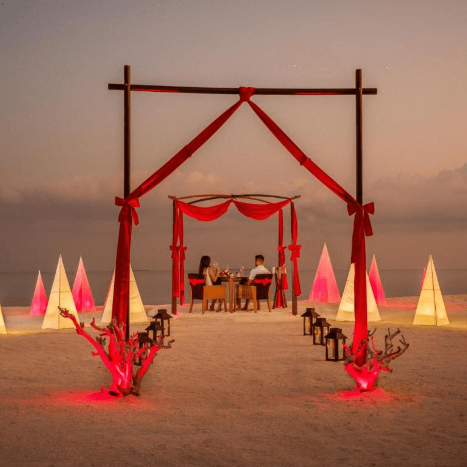 Indulge in a romantic private beach dinner under the stars.