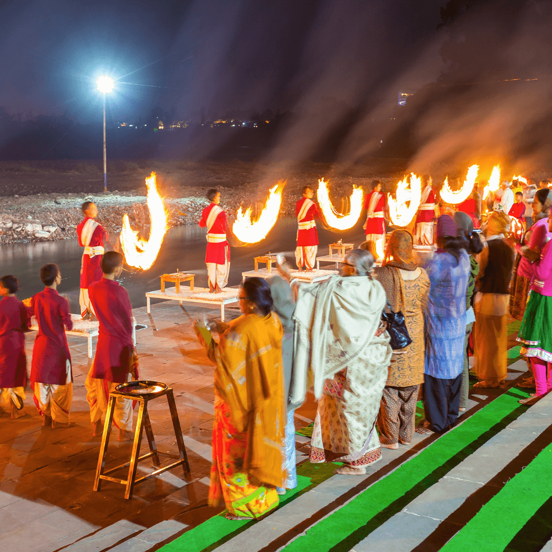 Experience the soul-stirring Ganga Aarti at Dashashwamedh Ghat, a spiritual ceremony that fills the air with chants and the glow of lamps, providing a peek into the religious fervor of Varanasi.